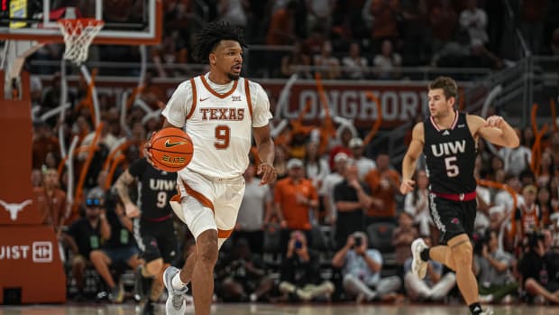 Texas Longhorns guard Ithiel Horton (9) dribbles the ball towards the University of the Incarnate Word basket during the mens basketball game at the Moody Center on Monday, Nov. 6, 2023 in Austin